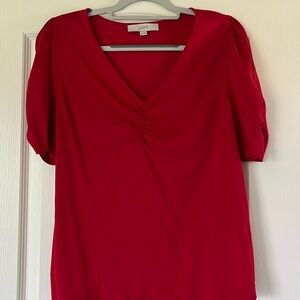 Adorable red LOFT top with ruching details on front and sleeves
